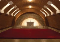 To build the crypt, Plečnik used masonry removed during renovations of the Prague Castle complex while working for President T. G. Masaryk.